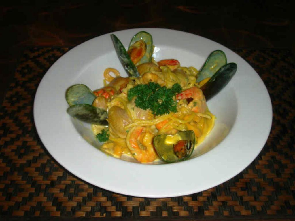 Le Parrots-Inn Praia de Jomtien Exterior foto